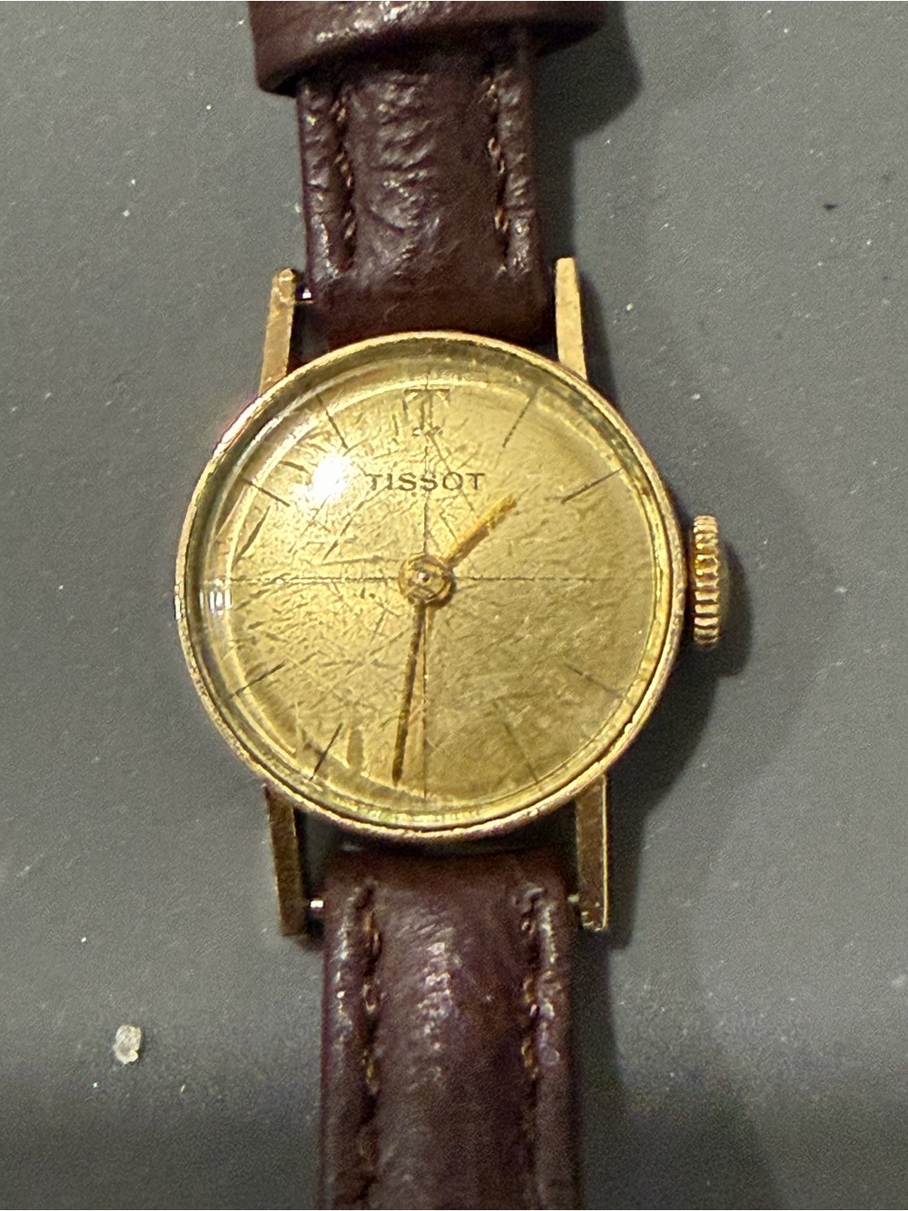 Tissot Gold Dial Watch with Brown Leather Strap